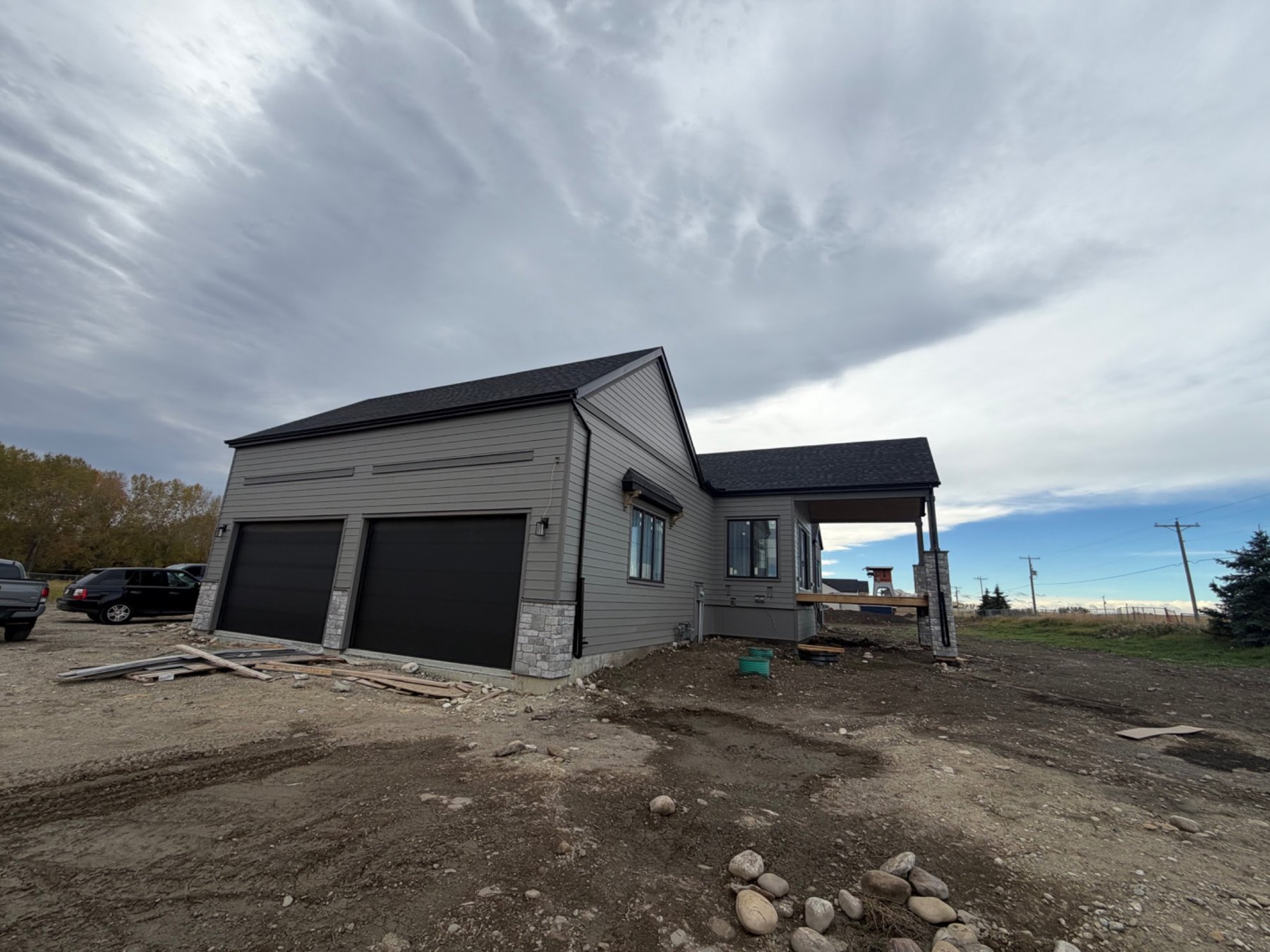 Garage exterior with matching siding and trim